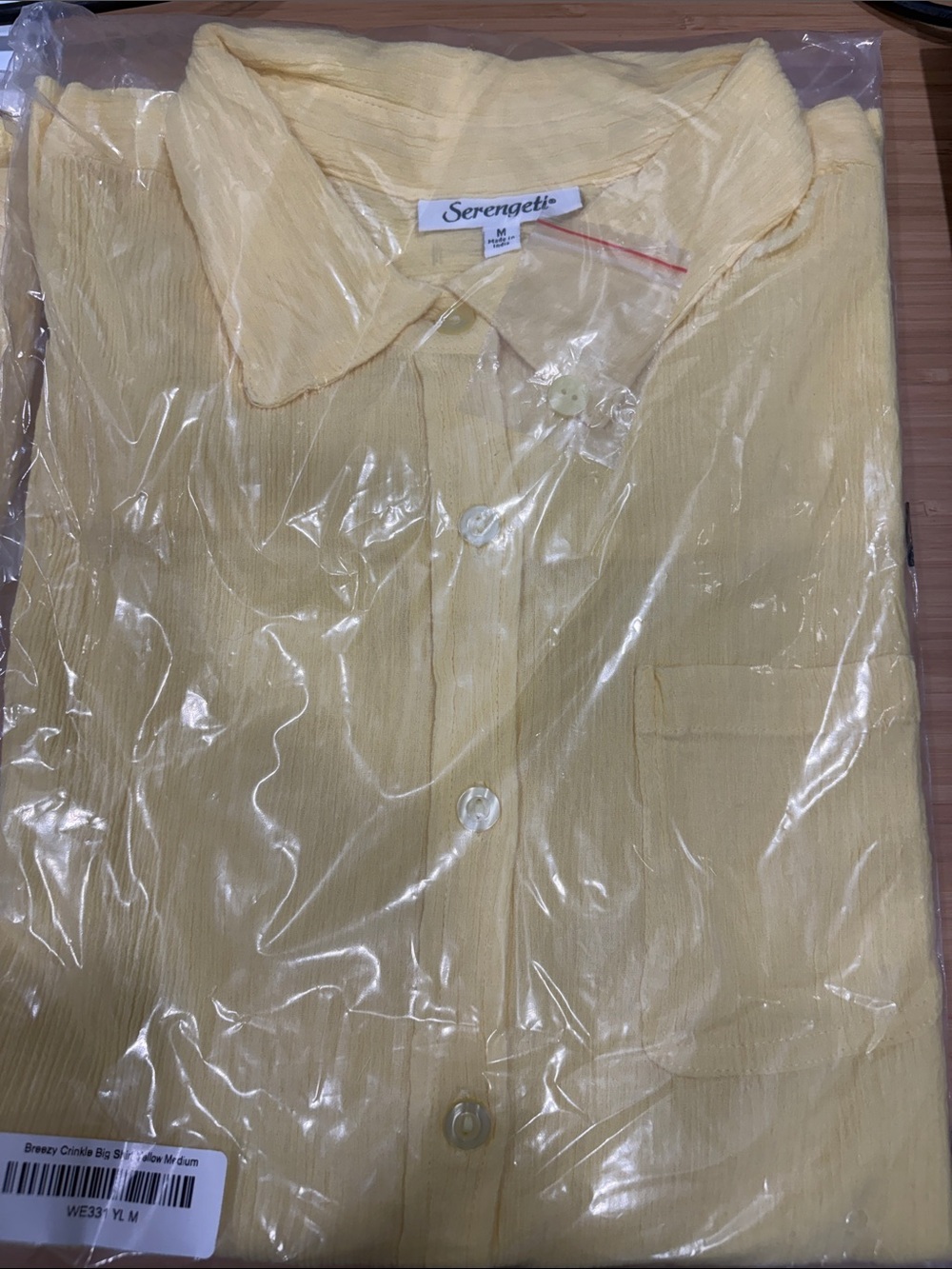Serengeti women’s Light Yellow Crinkle Long Sleeve Button-Down Shirt. Brand new!
